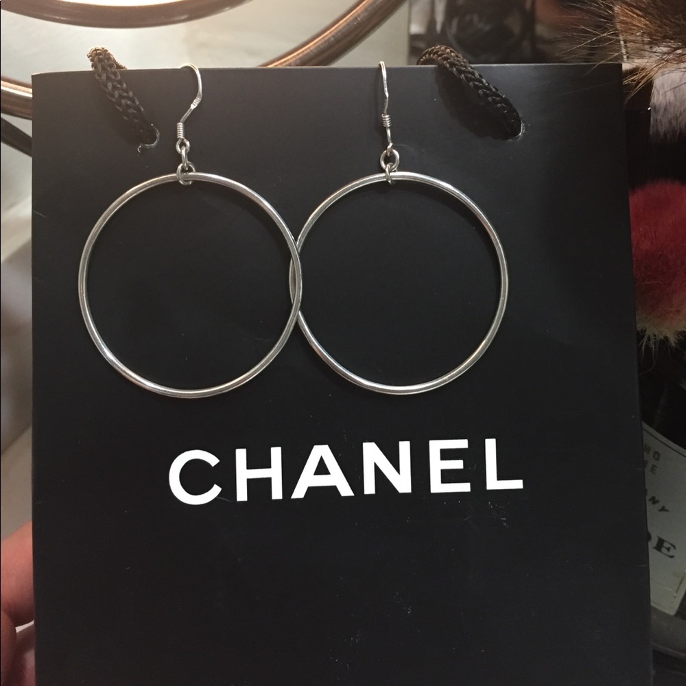 Stamped Sterling silver hoops.