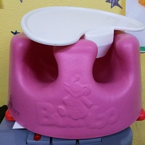 Pink Bumbo seat with tray