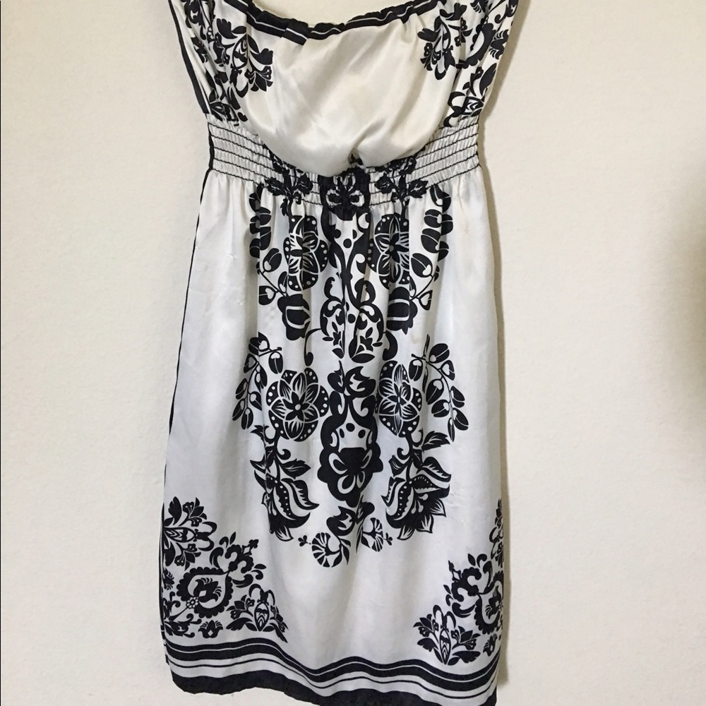 White and black silky dress