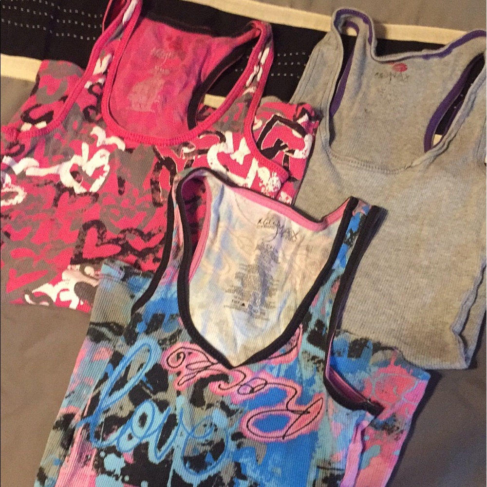 Bundle of three tank tops.