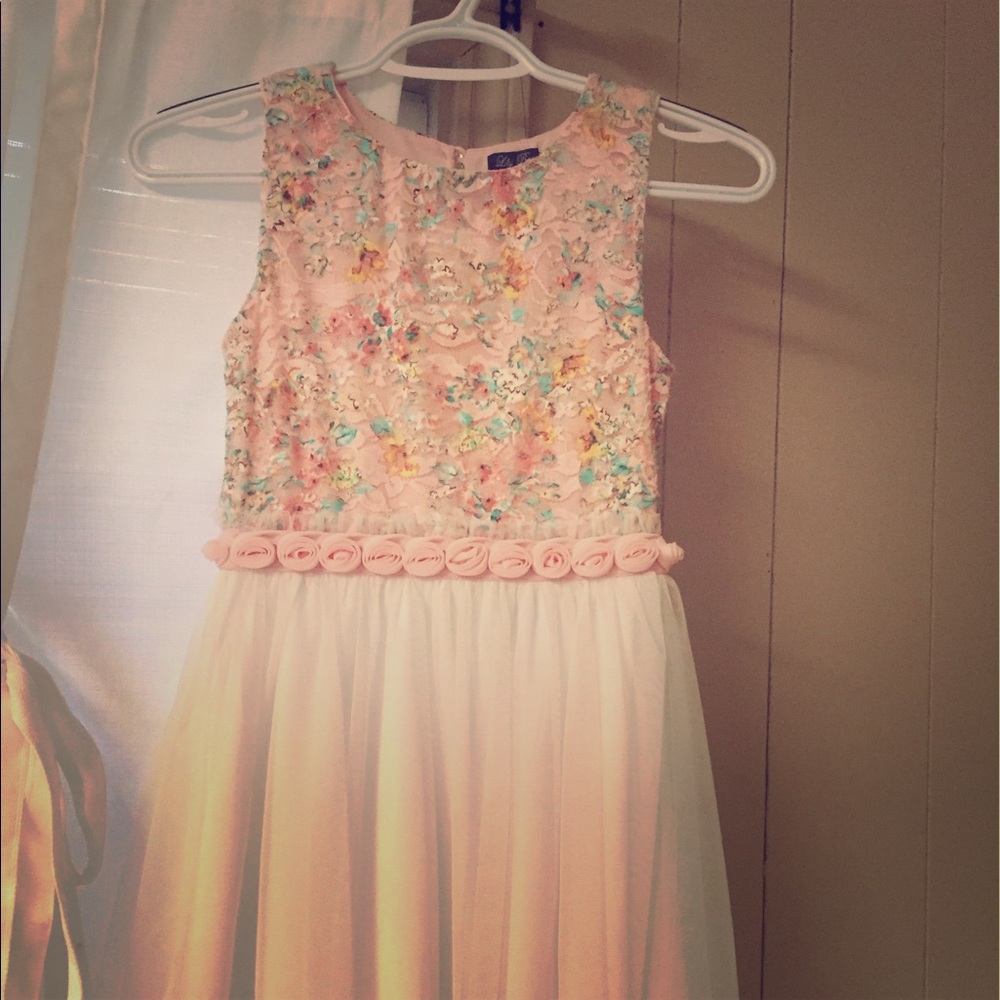2 spring/summer dresses. One in sz 10 other in 12