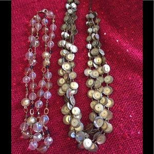 2 gold and crystal necklaces