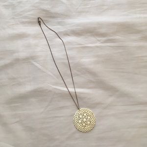 Hand carved shell necklace