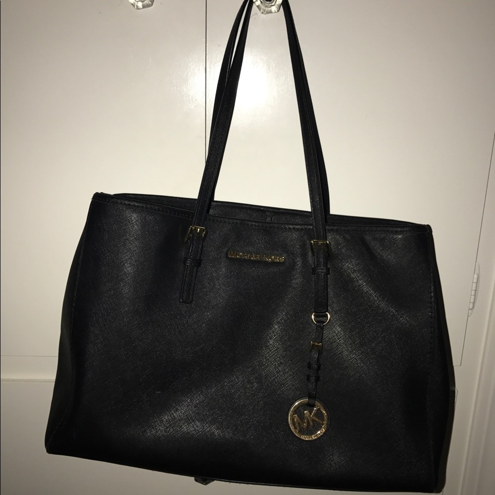 Black Michael Kors purse.