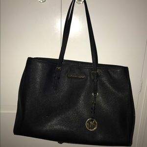 Black Michael Kors purse.