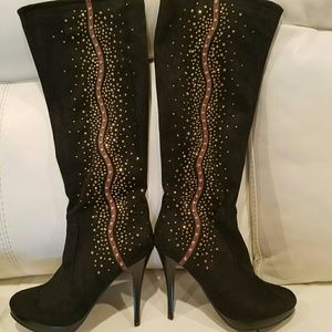 Never used black stacked boots with leather and rh