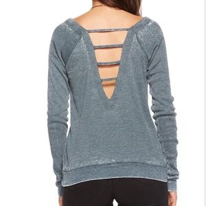 Chaser ribbed longsleeve V-neck with deep V back.