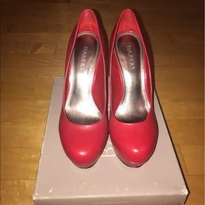 Women's red high heel pumps from Bakers