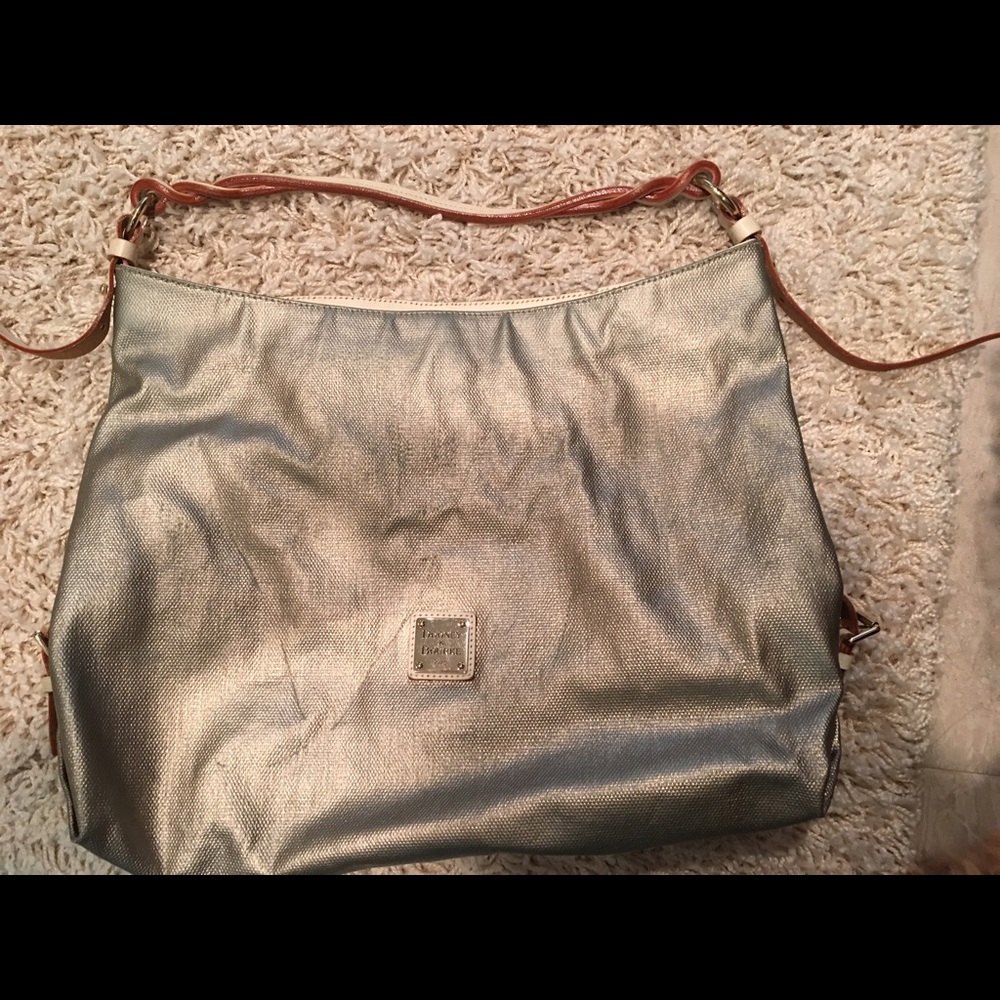 Dooney & Burke metallic gold leather bag. $90