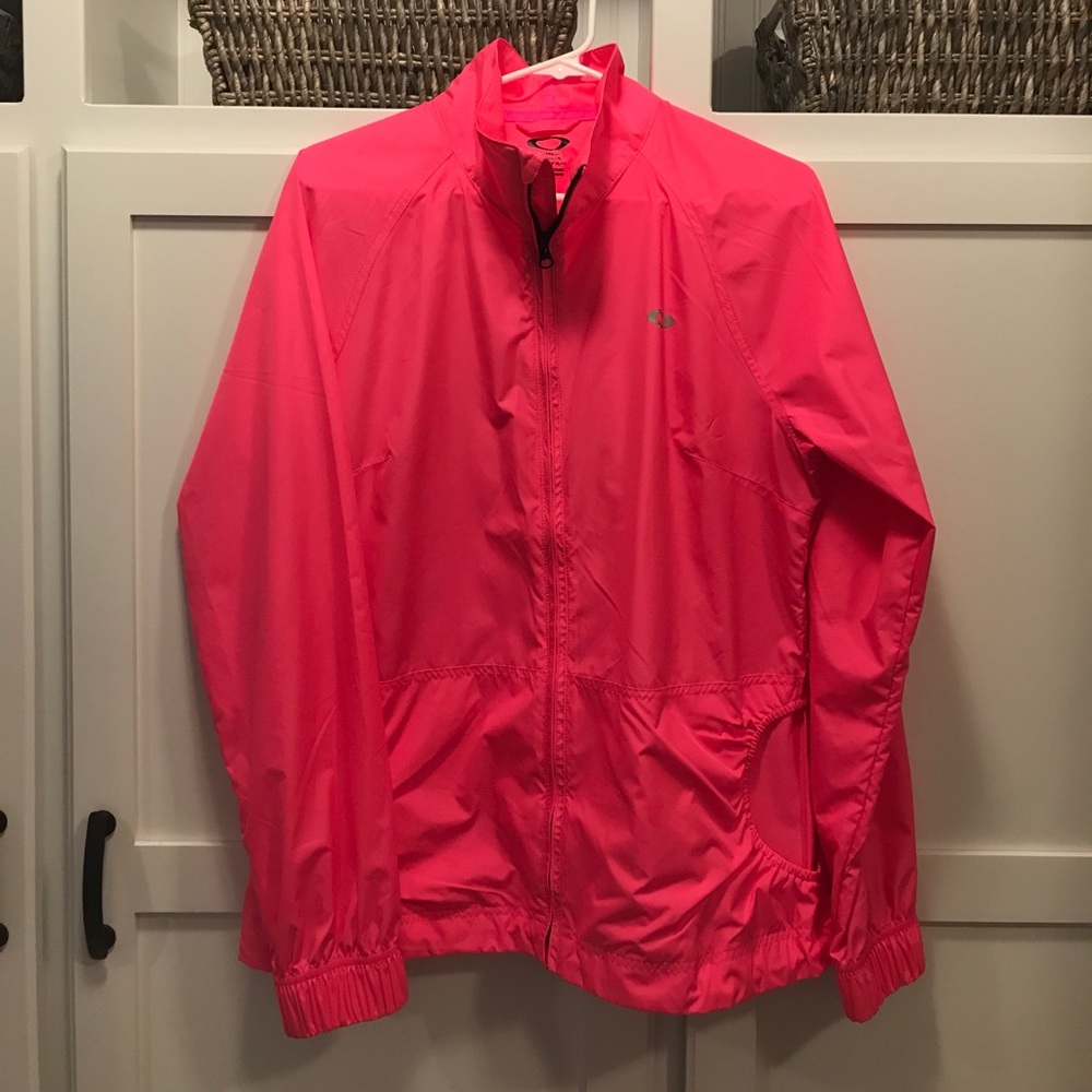 Hot pink Oakley windbreaker jacket.  Large