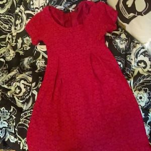 Pink summery dress with an empire waist.