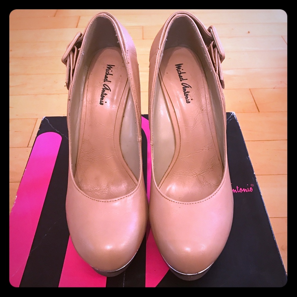 Tan high heel pumps by Michael Antonio.