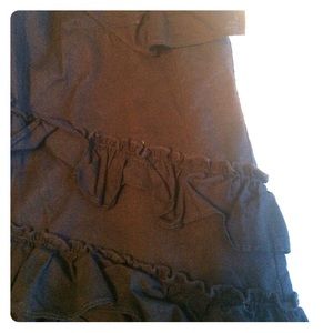 Sleeveless dress with ruffle detail