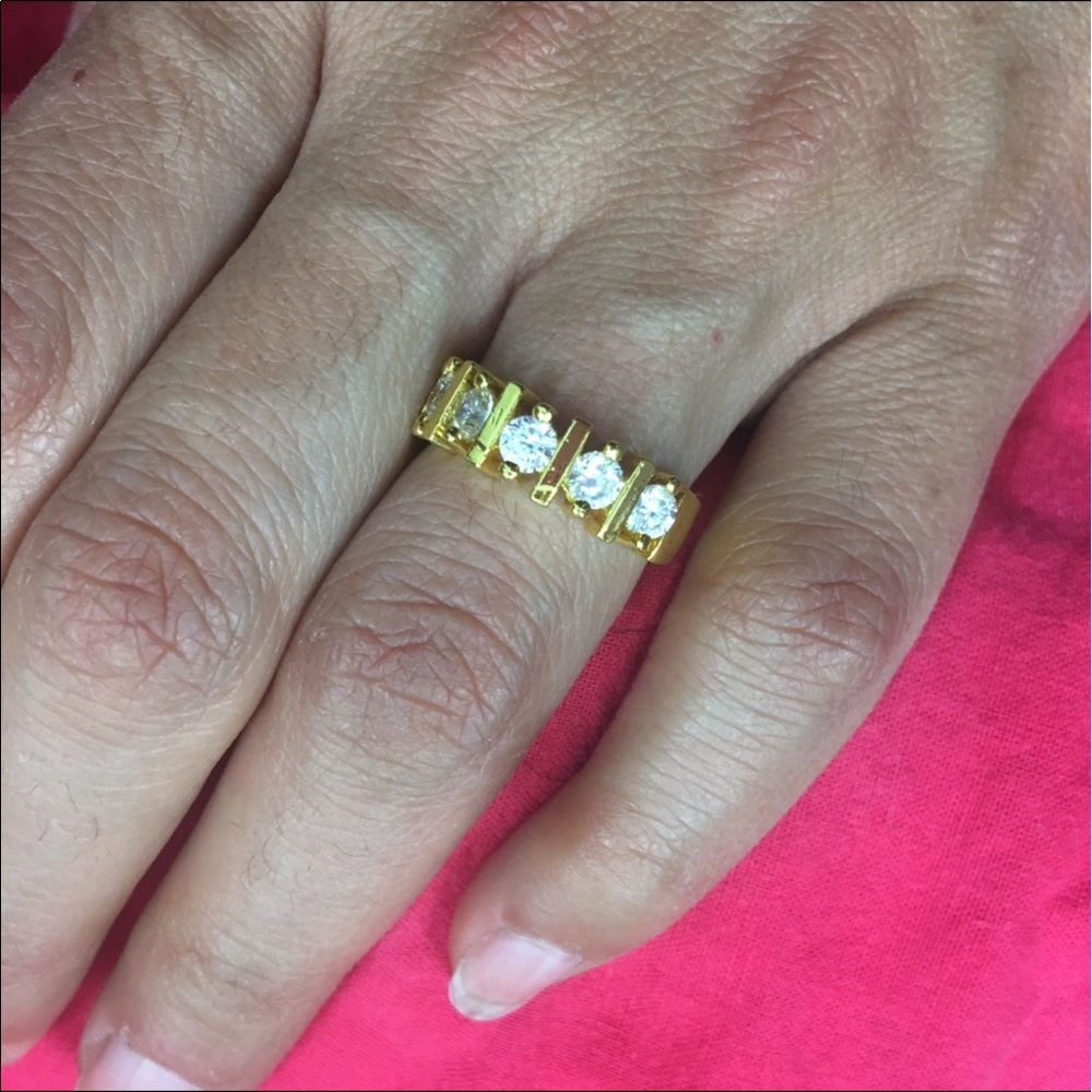 18 k gold anniversary ring.