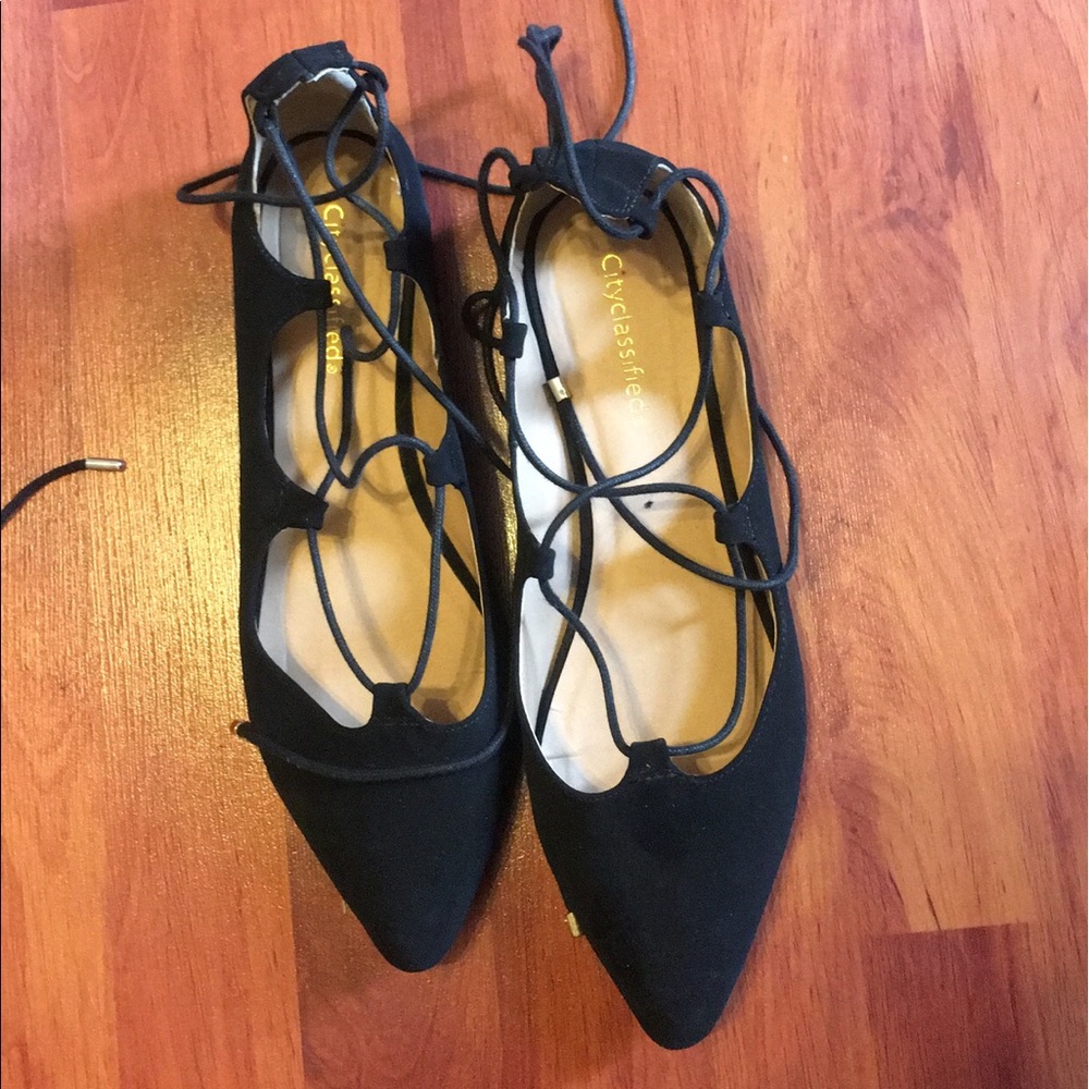 Black strappy flats