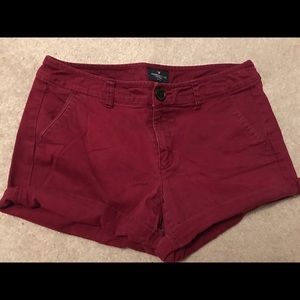 Red "midi" American Eagle shorts