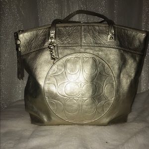 Original gold coach zipper arm bag.