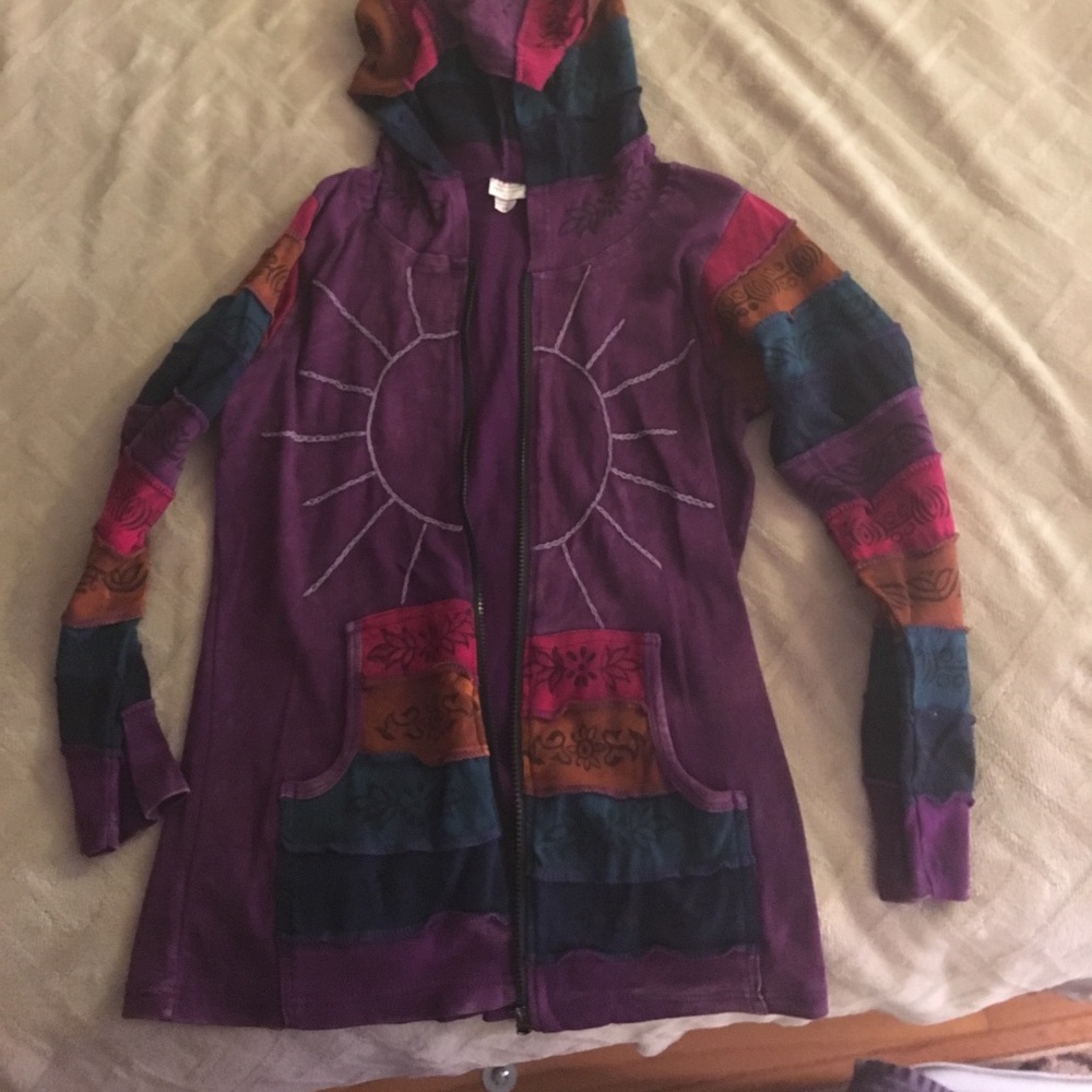 Purple zip up sweatshirt.