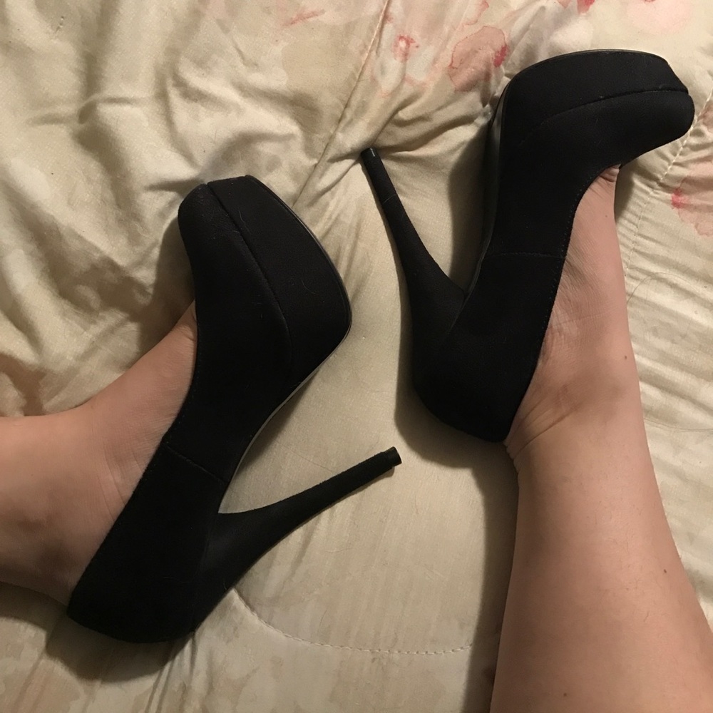 Black suede pumps