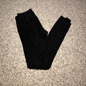 Delias.  Black velour leggings.