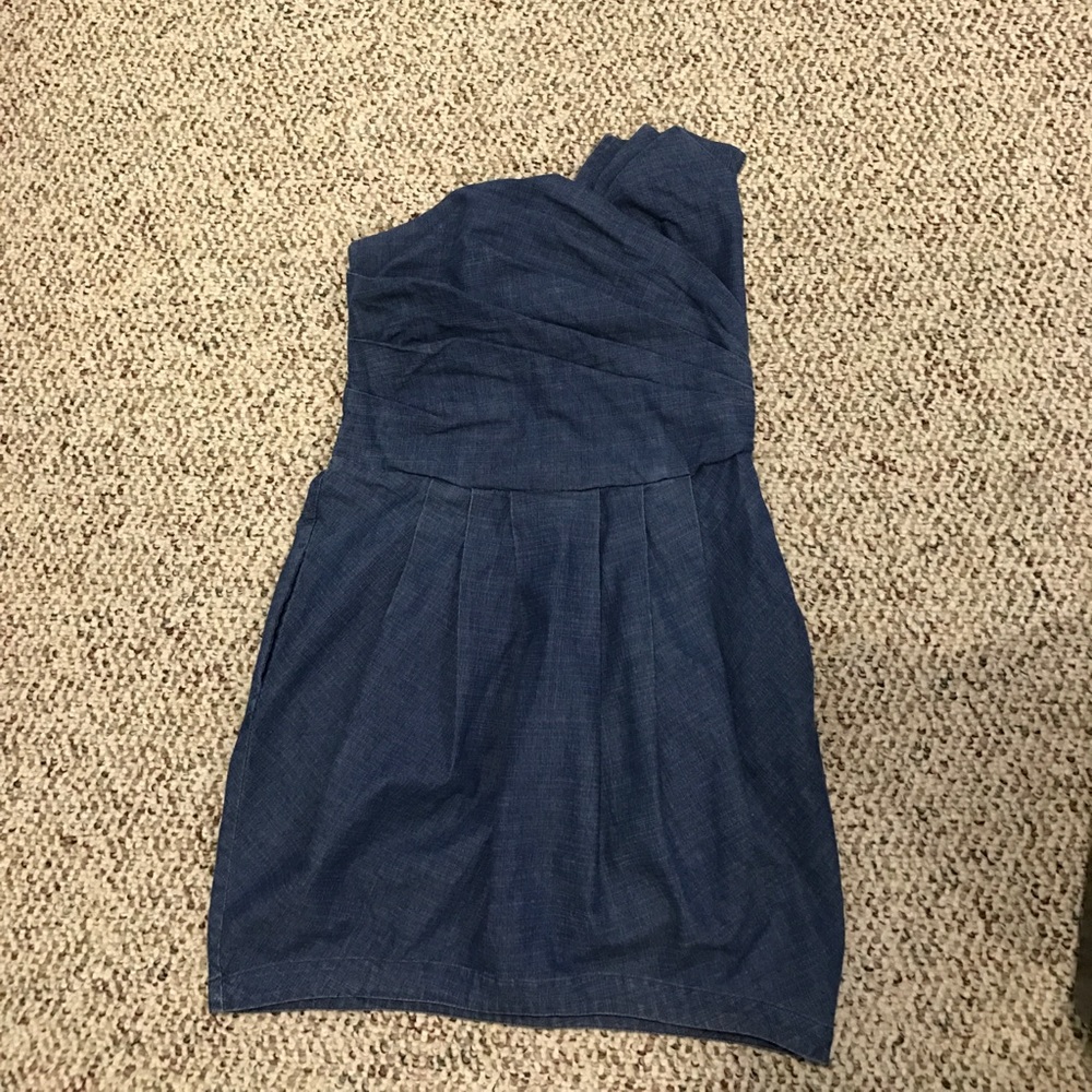 Strapless, symmetrical denim dress.