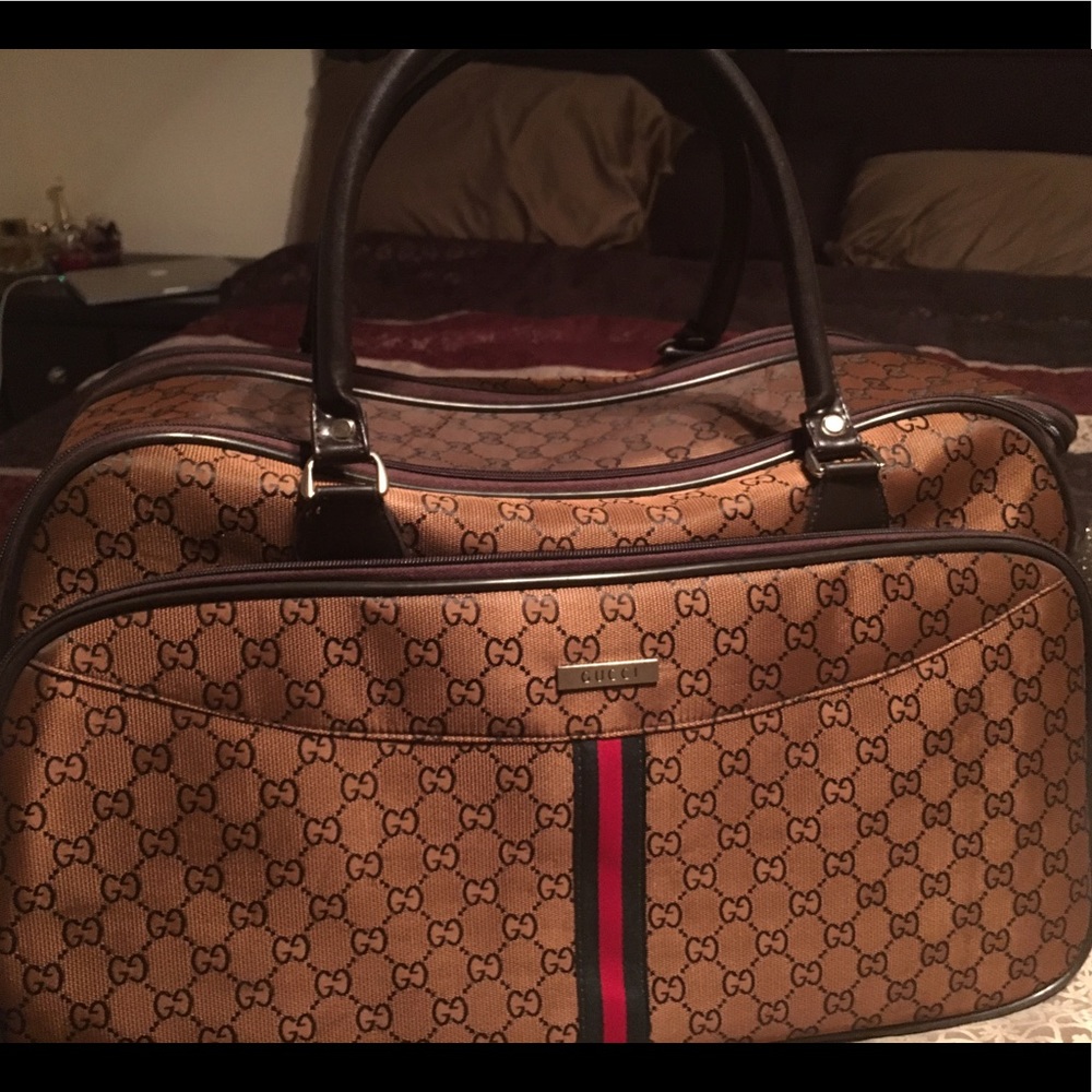 Gucci Bag / Luggage Roller.