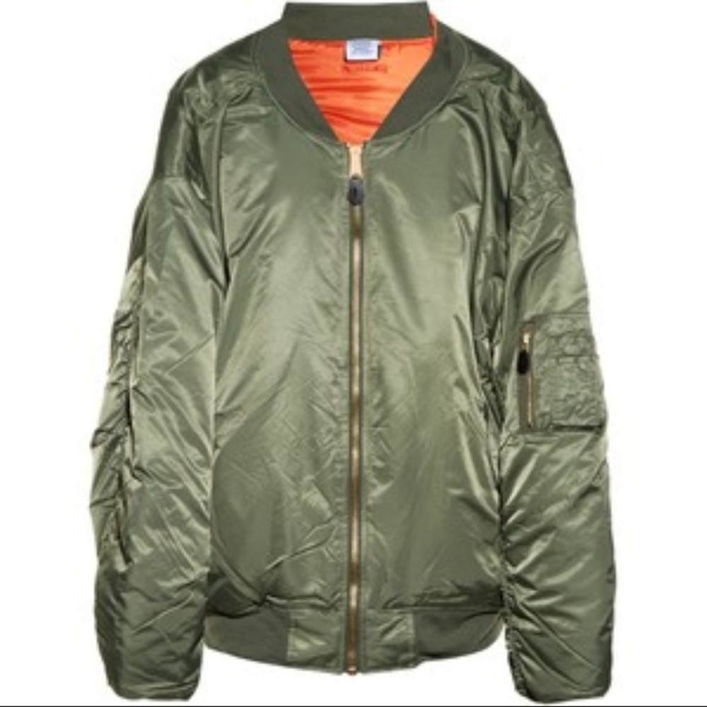 Oversized green bomber jacket with orange lining