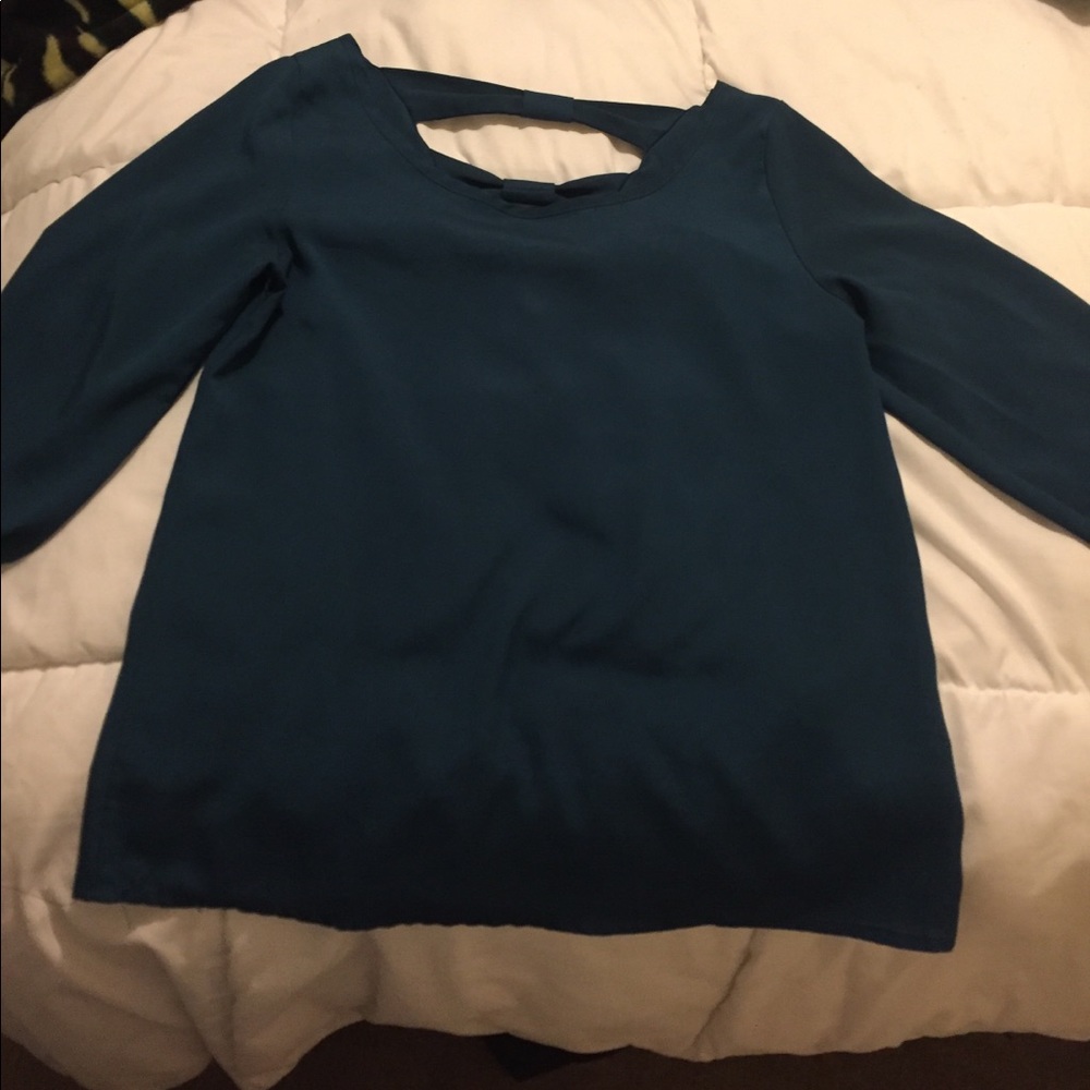 Quarter sleeve and decorative back blouse