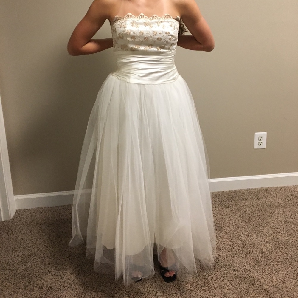 Strapless white and gold prom dress