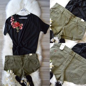 BDG Low rise dolphin olive green distressed shorts