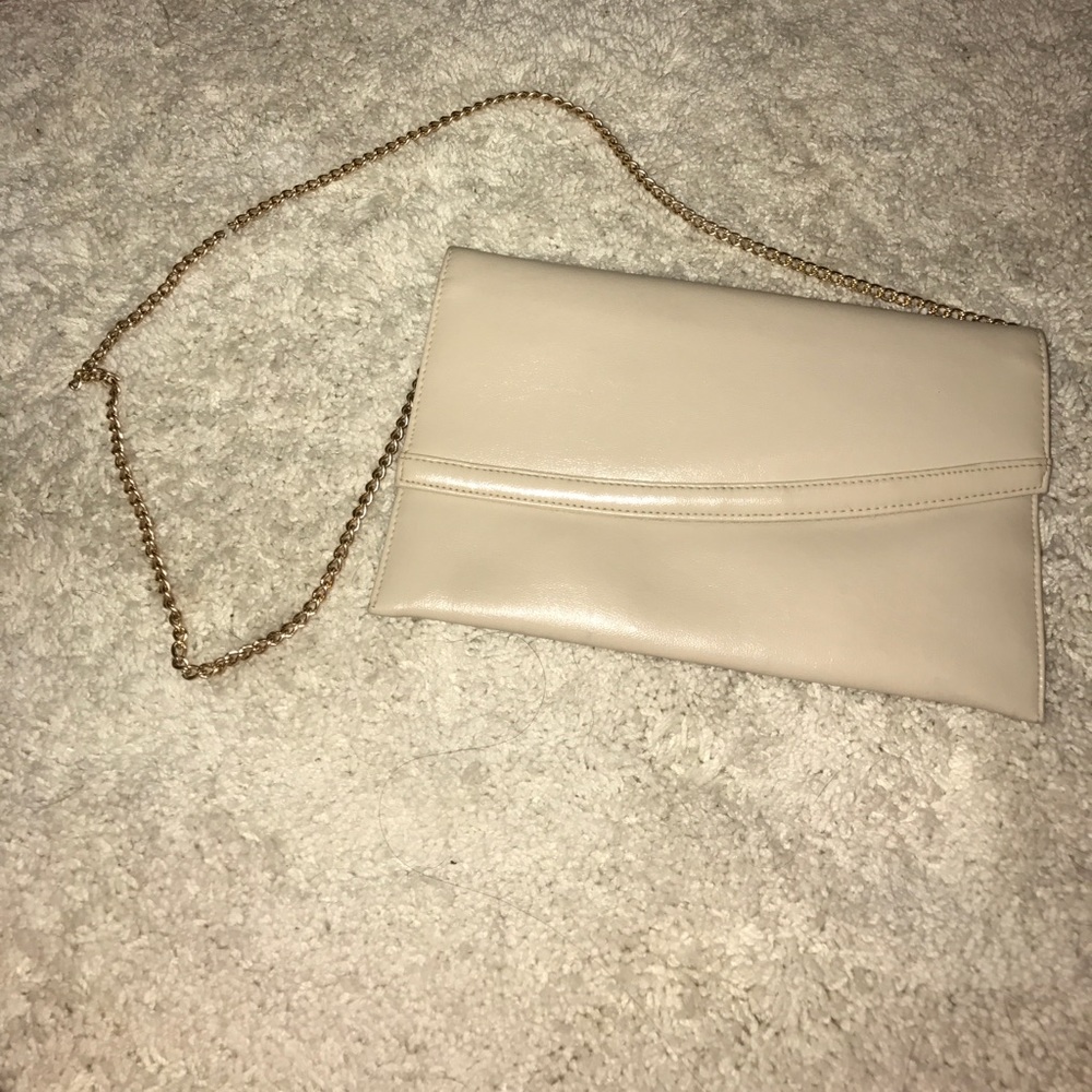 Cream large clutch shoulder strap