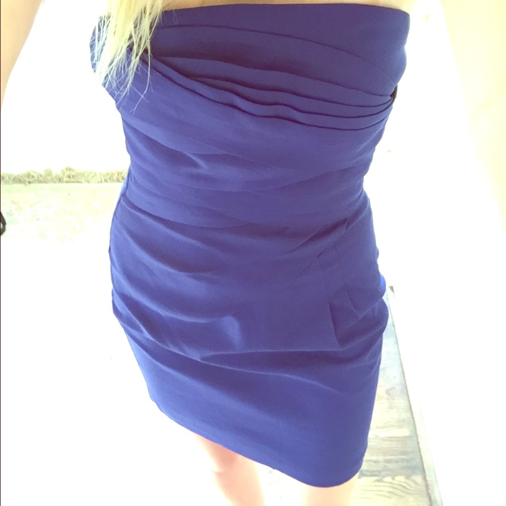 Aqua blue strapless dress.