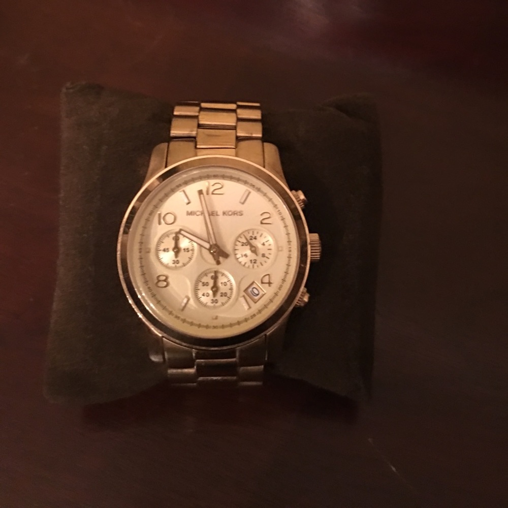 Large Runway Gold-tone stainless steel watch.