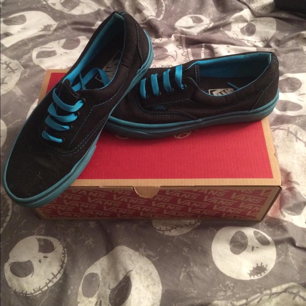 Black and blue Vans. Women's size 7. Worn