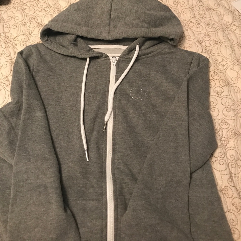 Grey zip up hoodie with "CK" rhinestone decal