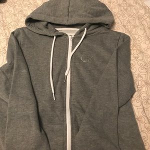 Grey zip up hoodie with "CK" rhinestone decal
