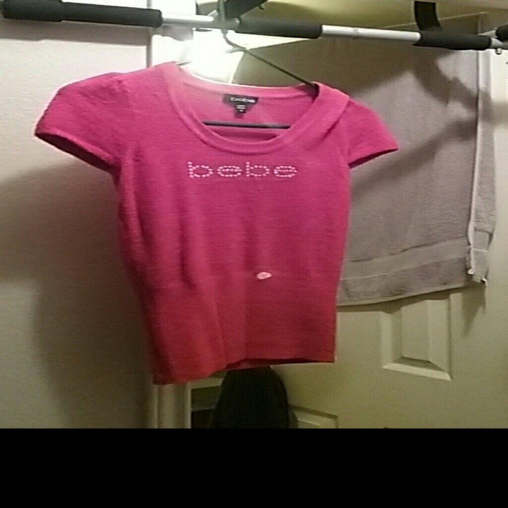 Red blouse ; with rhinestone  silver. In good cond