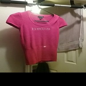 Red blouse ; with rhinestone  silver. In good cond