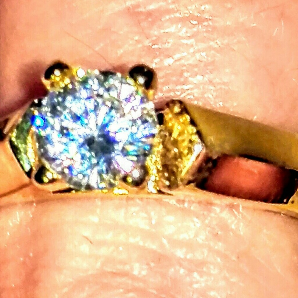 White Sapphire on 18ktgp over Sterling Silver ring