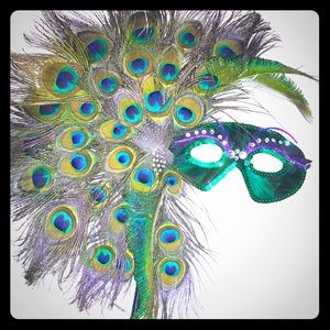 Mardi Gra mask with peacock feathers