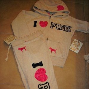 Pink sweat suit. Never worn. Excellent condition.