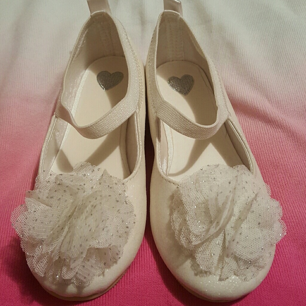 Sparkly white shoes with flowers