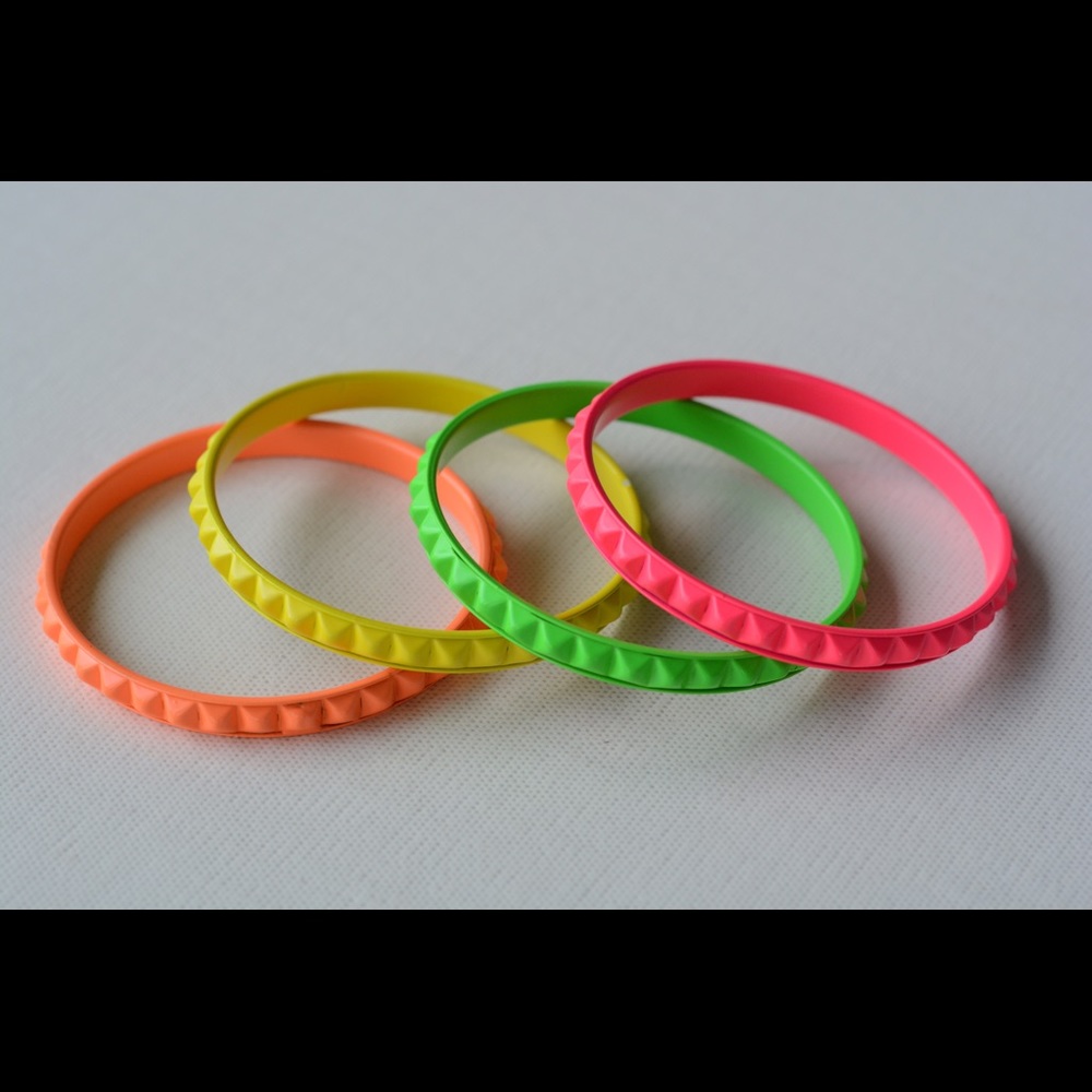 Four Vibrant Metal Bangles
