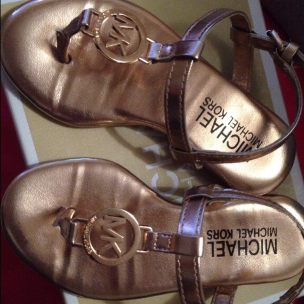 Gold Michael Kors ankle strap flat sandals