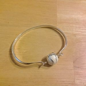 Reversible silver and white baseball bracelet