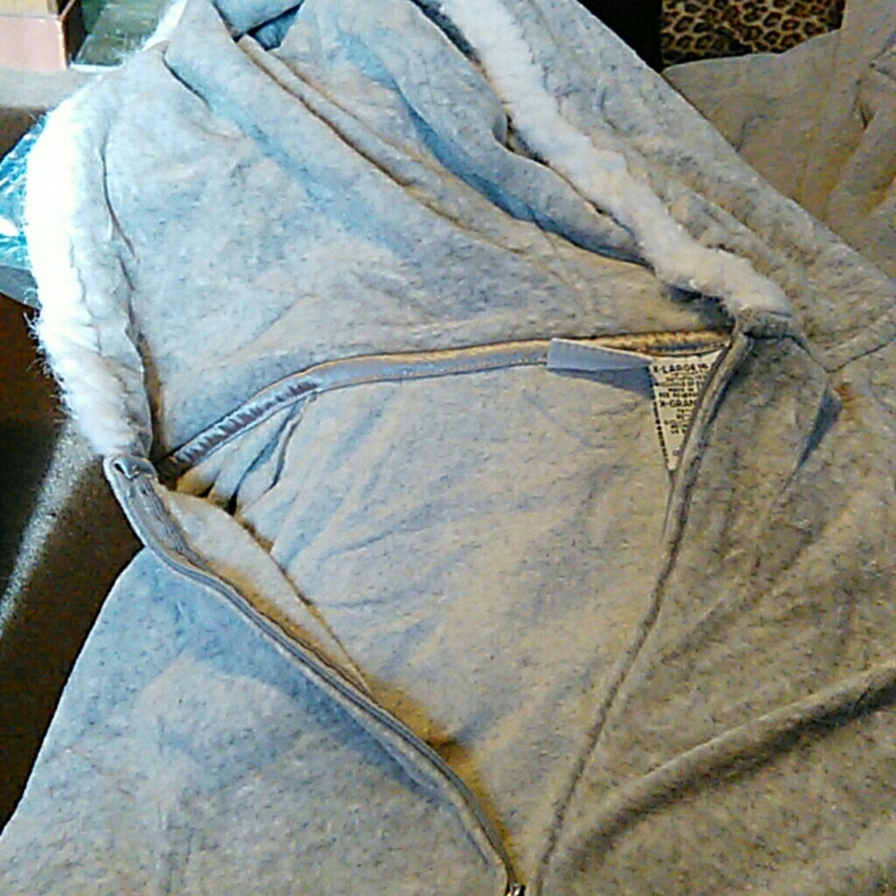 Light  sweater jacket with hood.