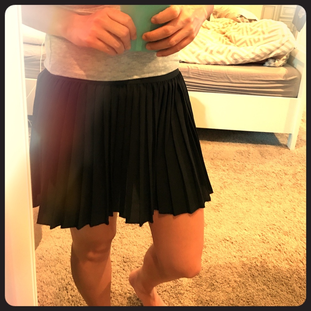 Black pleated schoolgirl skirt