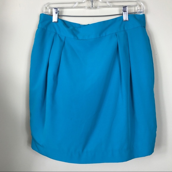 Blue tulip skirt Very pretty above the knee, tulip style skirt by Ann Taylor Loft Petites. Size 2P, fully lined. Gray, Blue and yellow tweed. Would look great with boots, heels or flats.