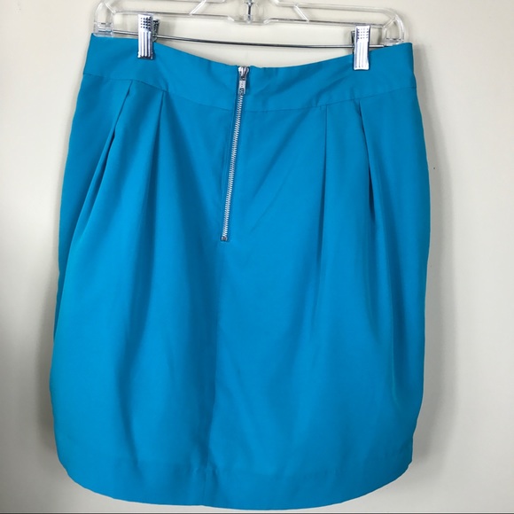 Shop by category Tulip slit in front flows into an extended, rounded-hem for midi skirt Brands: Stretch is Comfort, Playworld, Star Vixen, ICONOFLASH, NEARKIN and more.