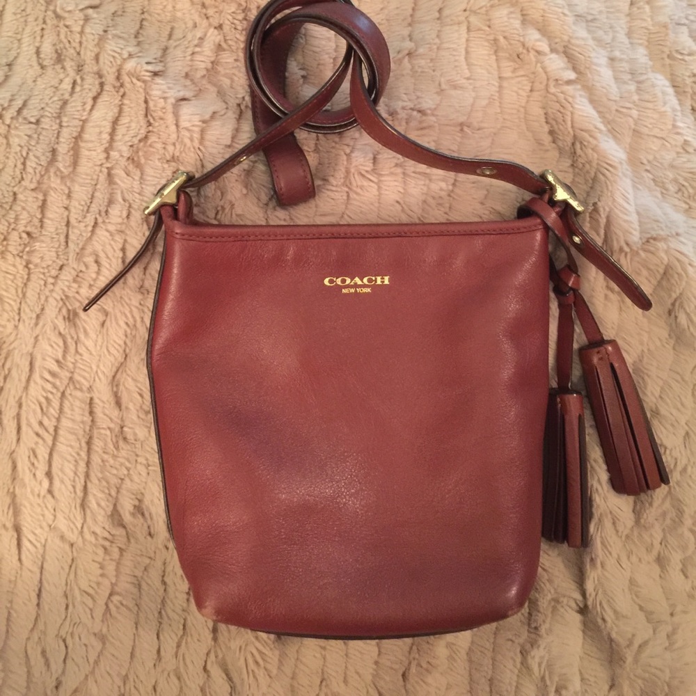 Coach Legacy crossbody mini cognac with tassels
